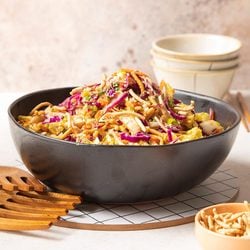 Cabbage Recipes Grilled Cabbage 3/4 view served with cutlery on a ceramic plate.